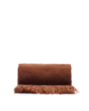 Salion blanket in a terracotta bouclé-effect wool blend, 130 x 170 cm by null, a Throws for sale on Style Sourcebook