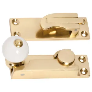 Porcelain Ball Sash Fastener, Polished Brass by Tradco, a Window Hardware for sale on Style Sourcebook