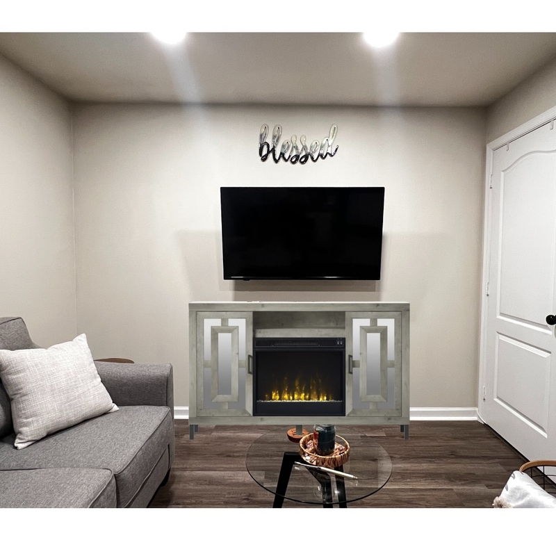 Living room w/ LED fireplace entertainment center Interior Design Mood Board by Chellz23